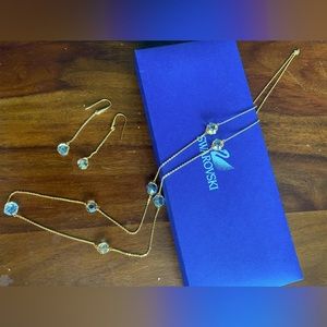 Swarovski gold long crystal necklace and drop chain earring matching set.